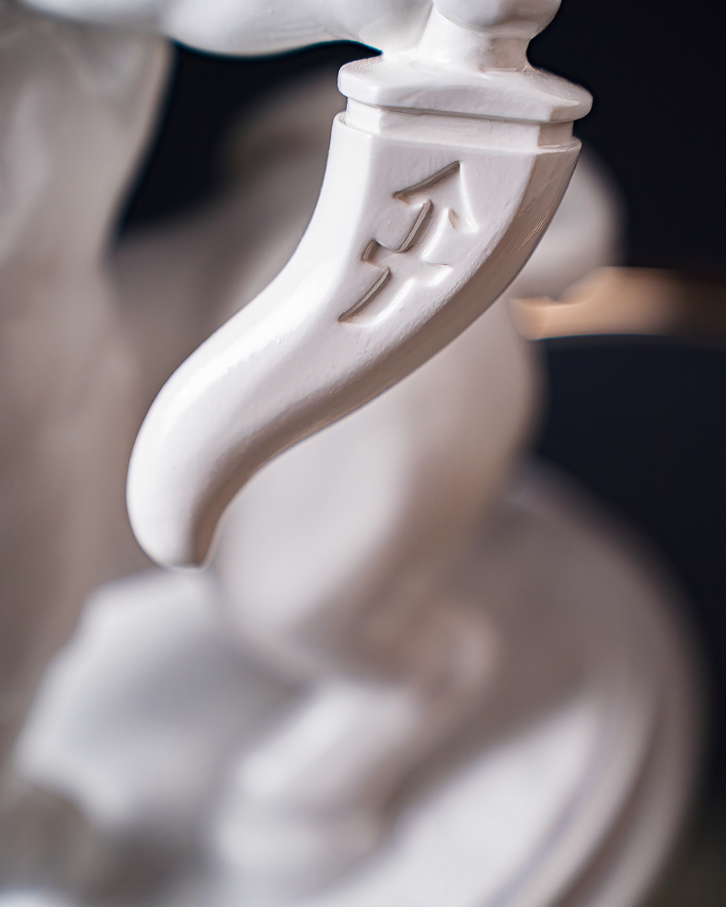 White Statuette Sagittarius